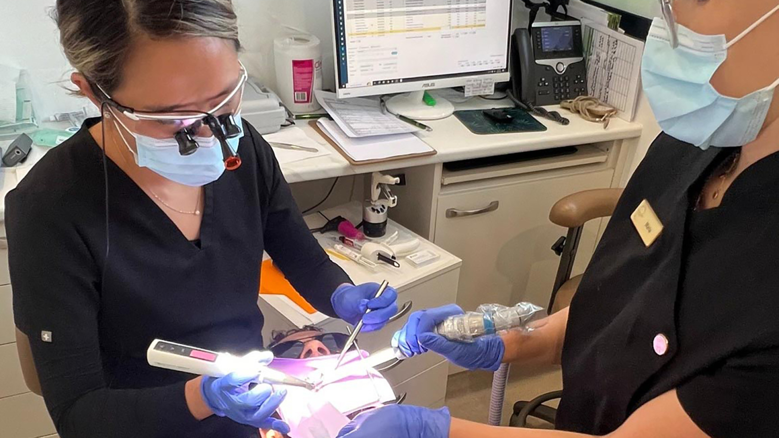 emergency-dentist-taking-care-of-a-patient