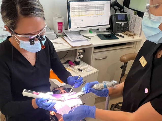 emergency-dentist-taking-care-of-a-patient