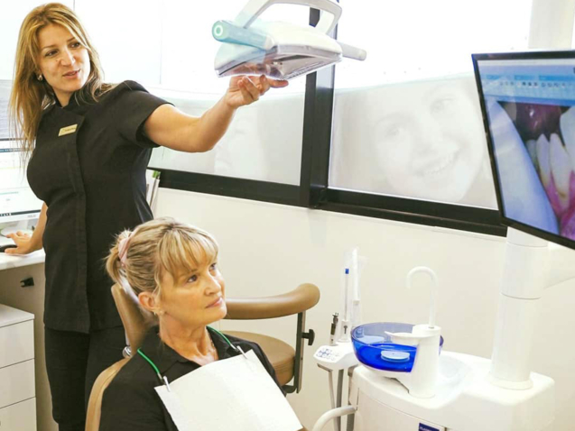dentist-showing-an-images-to-the-patient